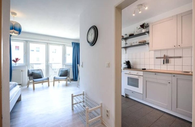 Bright city apartment with parking lot