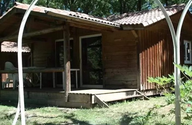 Camping La Truffière*** - Chalet Ombrage 3 rooms 6 persons view on the swimming pool and games