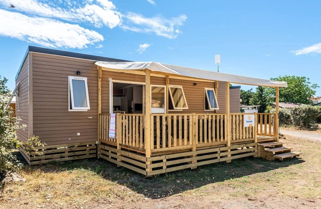 Campsite Romanée Les Grottes de Roffy* - Mobile home Premium 4 rooms 6 people air-conditioned