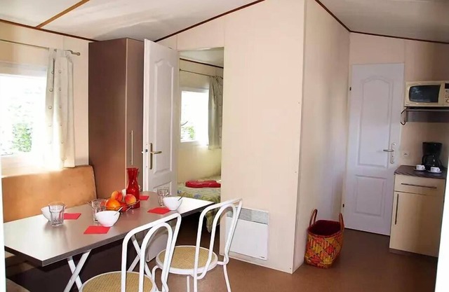 Campsite Tikayan La Prairie * - Mobile Home Colorado Air-conditioned Leisure 3 Rooms 4 People