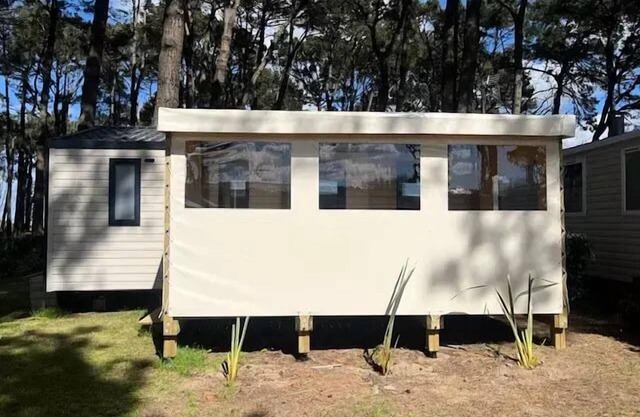Campsite Ushuaia Villages the Estuary * - Mobil home Comfort plus - 27m2 - 2 bedrooms + convertible - covered terrace 4 to 6 people - 4 pers. included in the tariff