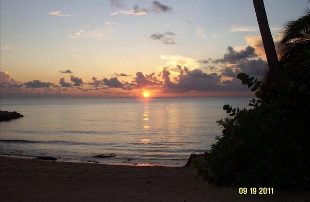 Cayman Islands Famous Seven Mile Beach Oceanfront Sunset Cove #104 corner unit
