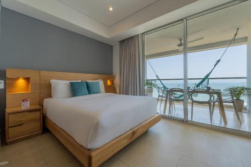 CB1223 | Suite con 2 camas, vista al mar y piscina