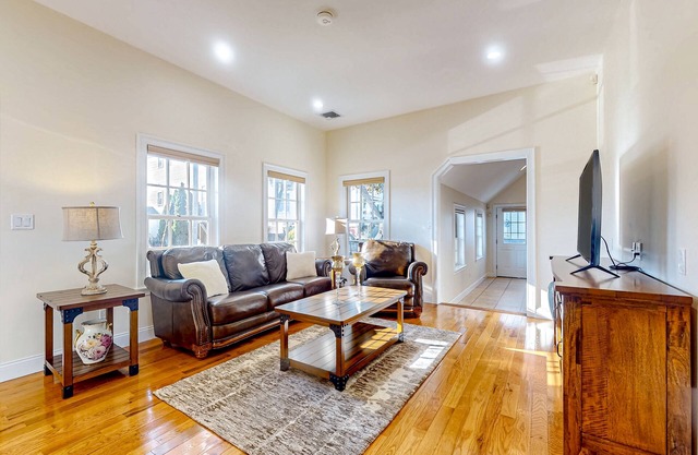 Centrally located charmer with expansive patio, board games, & central AC