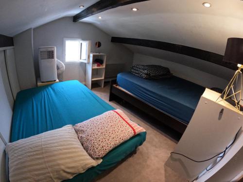 Chambre 4 personnes 2 lits proche métro 5