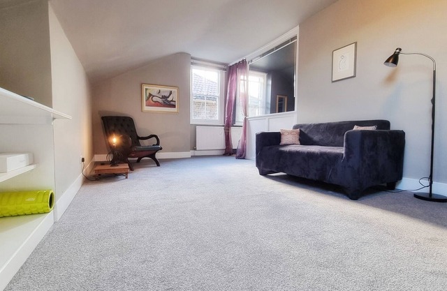 Characterful west London 1BR flat split over two levels with roof terrace
