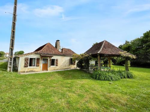 Charmante maison de campagne avec jardin et barbecue
