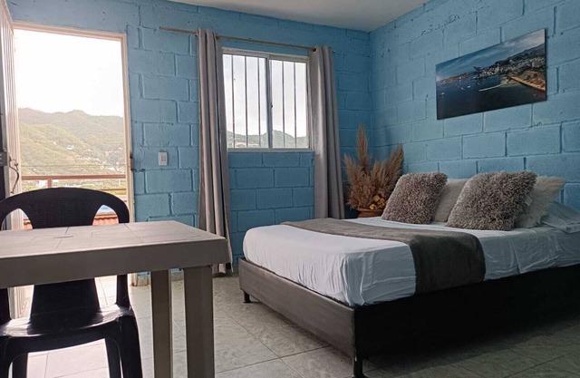 Charming bed & breakfast with 6 bedrooms and WiFi, AC in brilliant Taganga