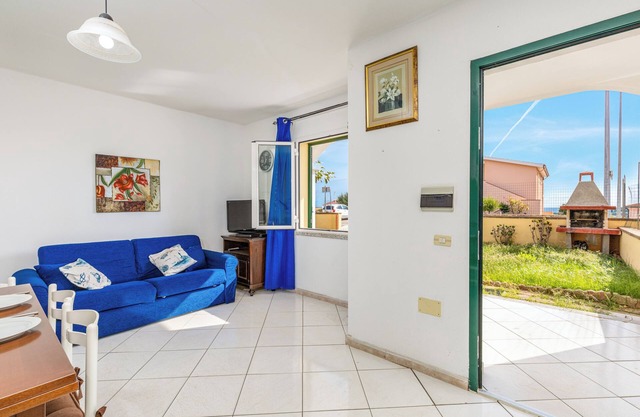 Charming Holiday Home Tanaunella appartamento 2 with Ventilators, Balcony, Terraces & Sea View; Parking Available, Pets Allowed