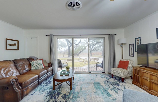 Charming house with backyard, patio, fire pit & game room with foosball table