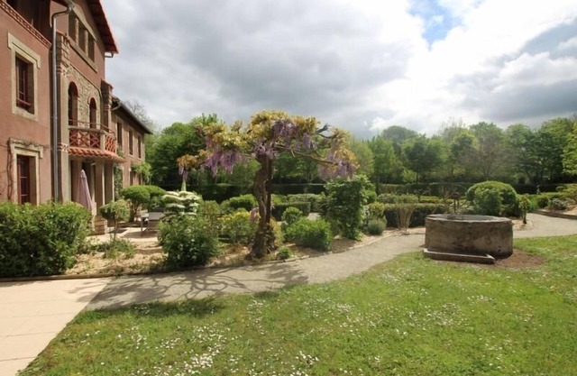 Charming Italian-Style Home with Pool in Scenic Village, Near Amenities