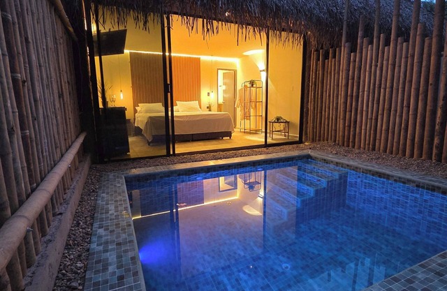 Charming one-bedroom villa in tropical Melgar with pool, AC – pet friendly