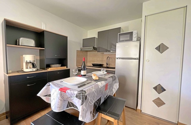 Charming Renovated Ground-Floor Studio with Garden and Parking in Secure Residence
