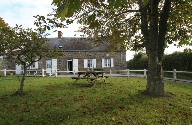 Charming Stone House with Garden Near Surville's Protected Beaches