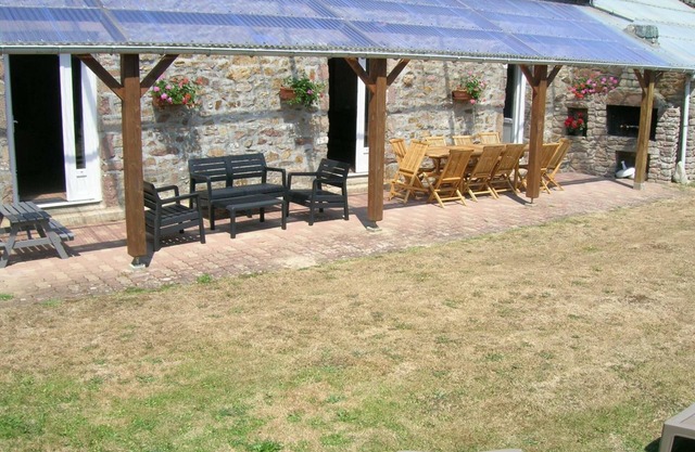 Charming Stone House with Private Bathrooms, Fireplace, and South-Facing Terrace in La Hague