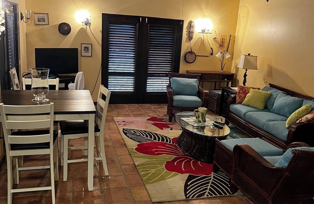 Classic Comfortable Caribe style villa with an expansive porch and pool.
