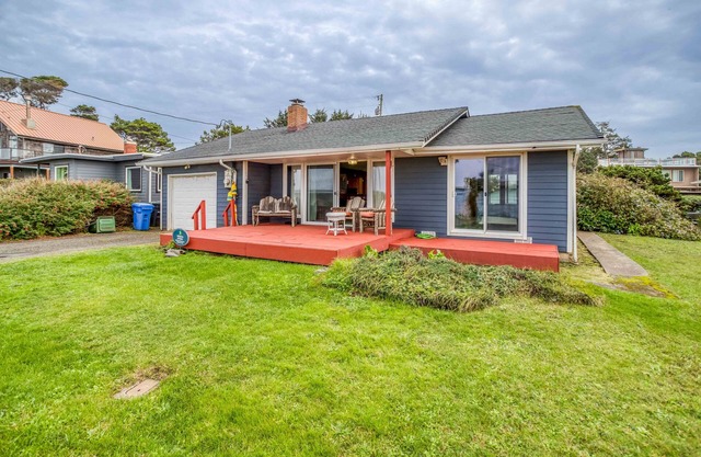 Classic Oregon Beach Home has Oceanview Deck, Fenced Yard, Fire Pit, and Hot Tub