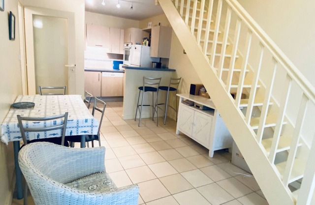 Coastal Haven: 2BR Apartment w/Mezzanine, Garage, Steps from Beach, Near Amenities