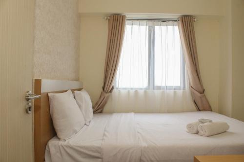 Comfort and Nice 2BR at Meikarta Apartment By Travelio