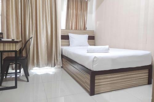 Comfort Studio at Vida View Makasar Apartment By Travelio
