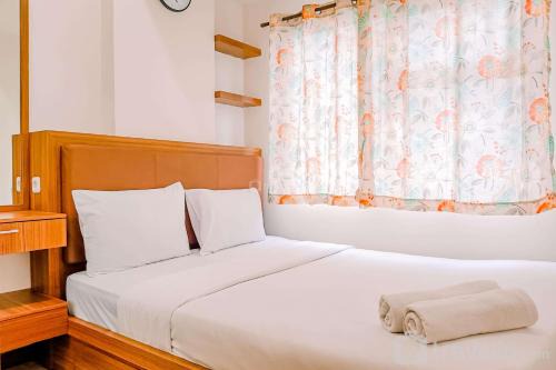 Comfortable 2BR Apartment at Vida View Makassar By Travelio