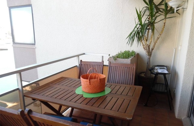 Comfortable 2BR with balcony, private parking near beach