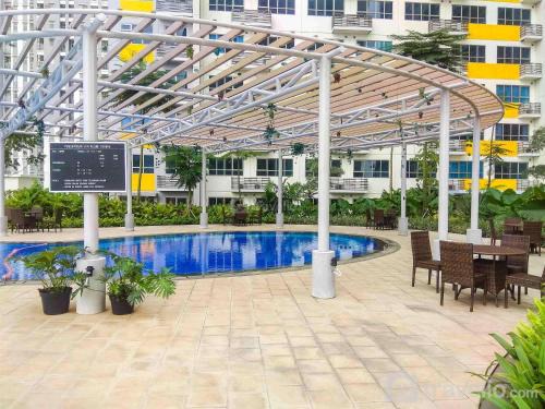Comfortable Studio at Springlake Summarecon Apartment near Mall By Travelio