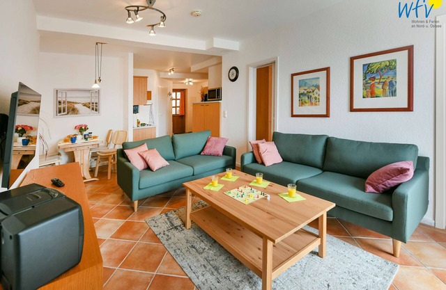 Comfortable vacation apartment with lake view and conservatory in the Seedorf vacation park