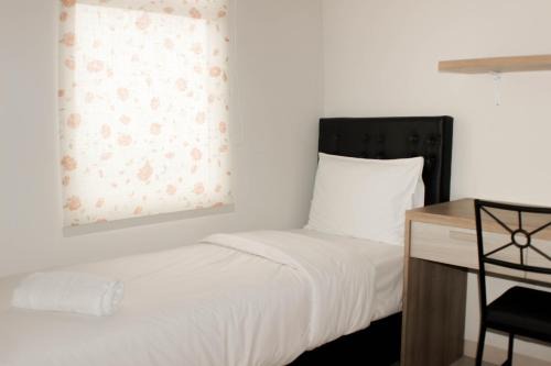 Comfy and Spacious 2BR at Springlake Summarecon Apartment Bekasi By Travelio