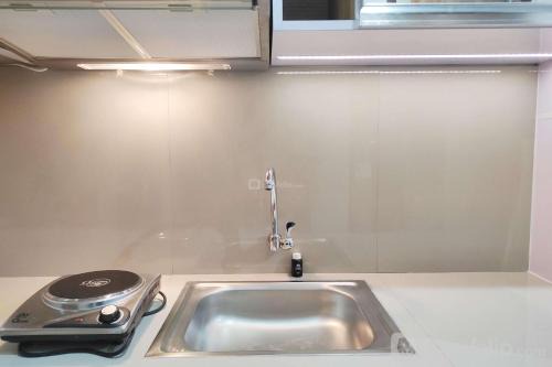 Compact Studio at Vida View Makassar Apartment By Travelio