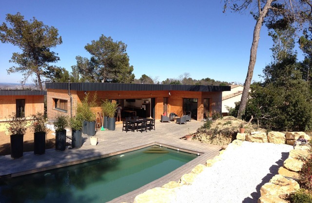 Contemporary wooden house with swimming pool on large quiet plot.
