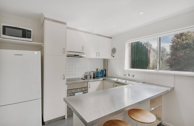 Convenient 2 Bedroom Townhouse with Parking