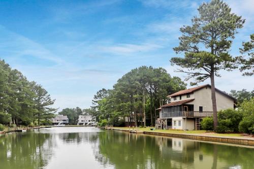 Coral Cove - fun waterfront home with floating dock and amazing patios