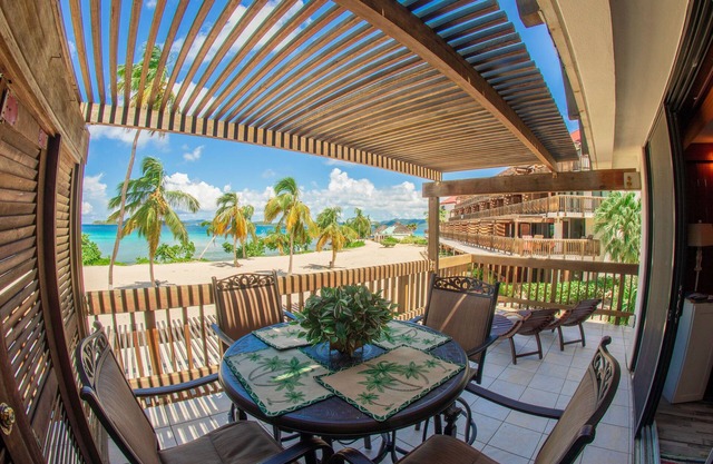 Corner unit with unobstructed views of Sapphire Beach which is steps away.