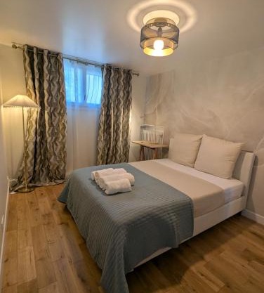 Cosy appartment with access to garden, parking and direct line to Eiffel tower