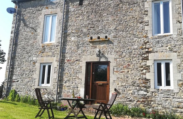 Cottage in Sainte-Marguerite-d'Elle with garden
