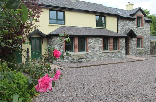 Courtyard cottage overlooking lakes, Killarney.