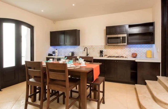 Cozy 1BR + sofa bed, steps from beach