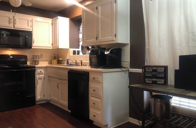 Cozy bedroom w/attached bath in fabulous Overland Park