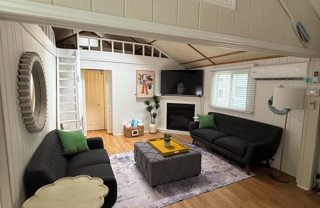 Cozy Grand Bend Cottage steps to the beach and the main strip with large deck!