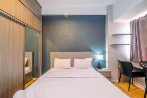 Cozy Living and Homey Studio Apartment at Margonda Residence 5 By Travelio