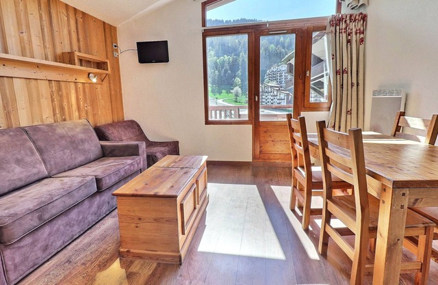 Cozy Ski-in/Ski-out 1BR Apartment with Balcony at La Tania in Courchevel