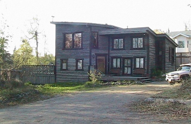 Custom Alaskan Home on 2 acres of wooded property adjacent to bird sanctuary