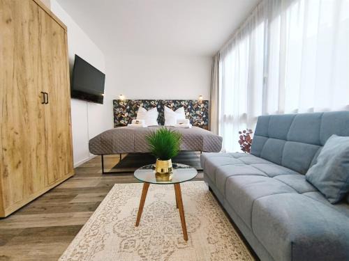 Design-Apartment für bis zu 4 im 1 OG, modern, Dachterrasse, Grill, ruhige Lage, Disney plus, Wii, LAN und WLAN