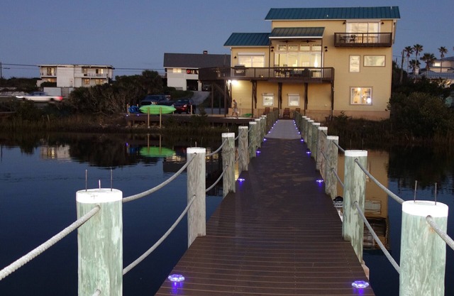 Directly on Intracoastal Sunsets on the East Coast, king beds in every bedroom!