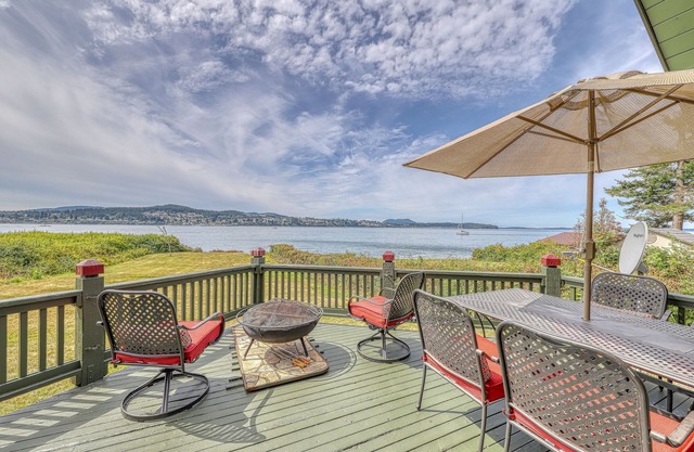 Dog-friendly beachfront home with firepit & breathtaking water views