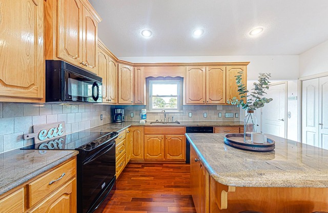 Dog-friendly home steps from the beach with sundecks & screened porch