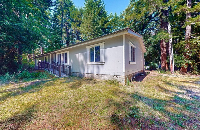 Dog-friendly house near golf & beach access with firepit, grill, & pellet stove