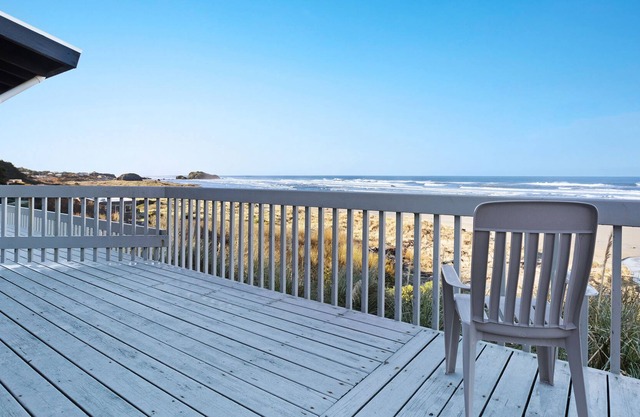 Dog-friendly, oceanfront condo w/ beach access, cozy fireplace, and large deck