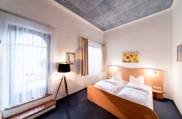 Doppelzimmer Basic mit Terrasse - Arthotel Magdeburg Gmbh